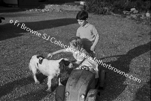 JOHN BICKFORD WITH ROCHE    PLAYING WITH TOY CAR